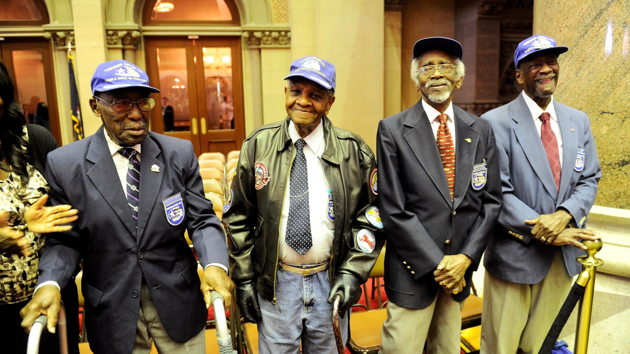 Tuskegee Airmen, from left , Audley Coulthurst of Queens, N.Y., William Johnson of Glen Cove, N,Y, Wilfred R. DeFour of Harlem, N.Y., and Herbert C. Thorpe of Rome, N.Y., are honored by members of the New York Assembly upon their 75th Anniversary of the 332nd Fighter Group of the U.S. Army Air Corps during a recognition ceremony in the Assembly Chamber at the Capitol on Thursday, June 16, 2016, in Albany, N.Y. - Associated Press