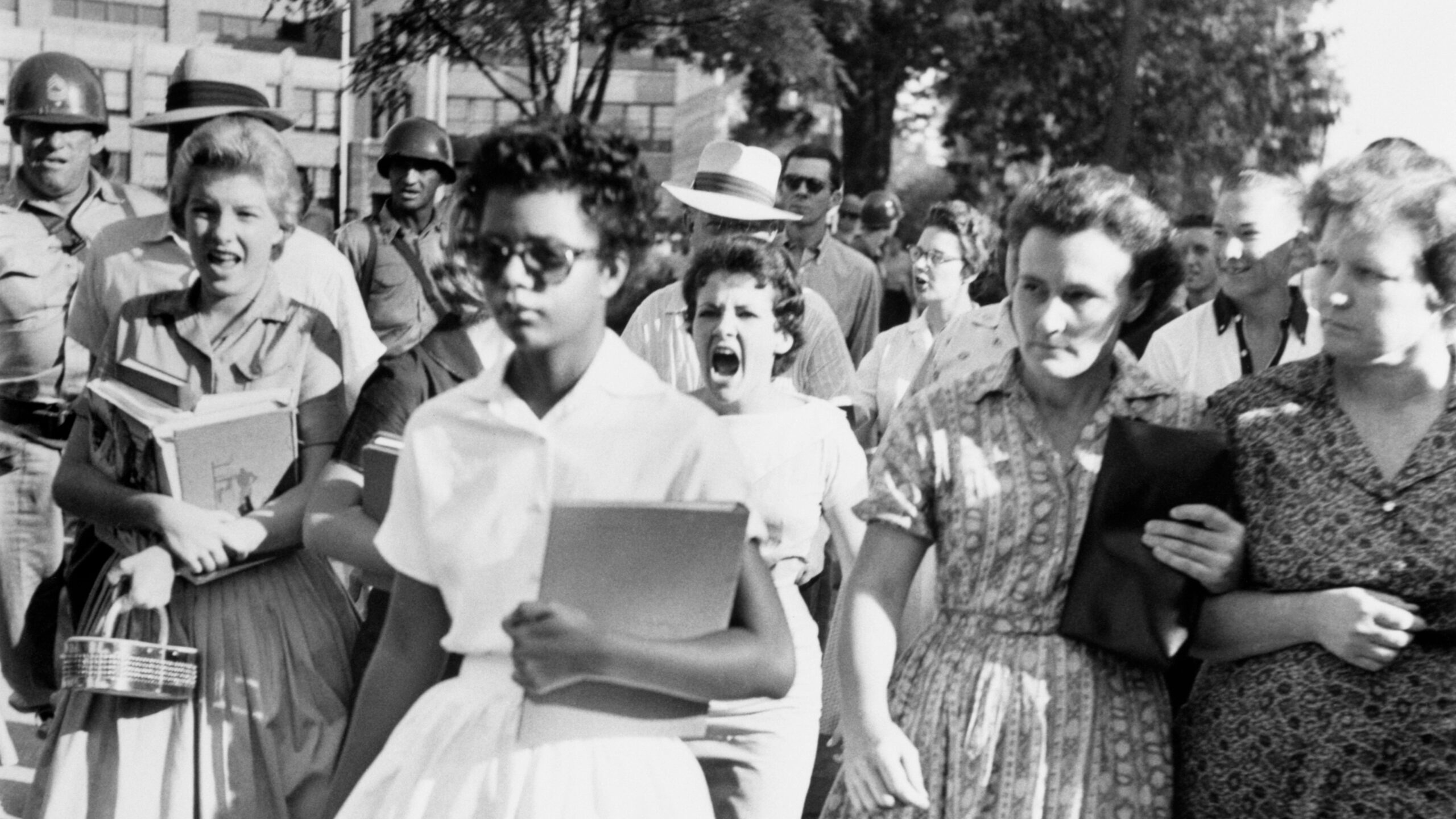 Elizabeth Eckford ignores the hostile screams and stares of fellow students on her first day of school, 6th September 1957. She was one of the nine African -American students whose integration into Little Rock's Central High School was ordered by a Federal Court following legal action by the National Association for the Advancement of Colored People (NAACP). - Getty Images