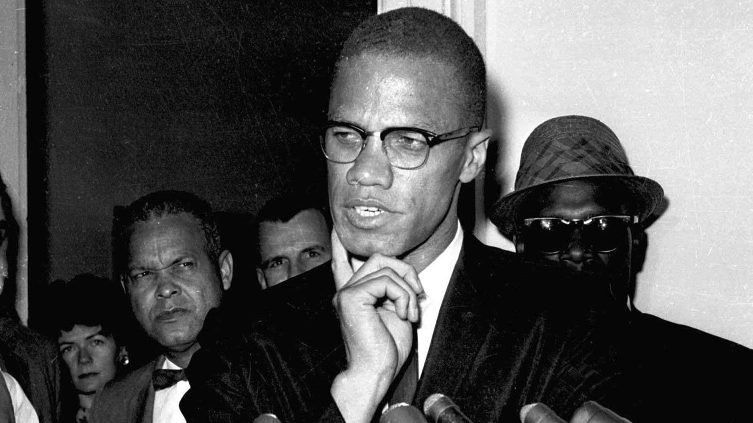 Malcolm X speaks to reporters in Washington, D.C., May 16, 1963. Two of the three men convicted in the assassination of Malcolm X are set to be cleared Thursday, Nov. 18, 2021, after insisting on their innocence since the 1965 killing of one of the United States' most formidable fighters for civil rights, Manhattan's top prosecutor said Wednesday, Nov. 21, 2021. - Associated Press