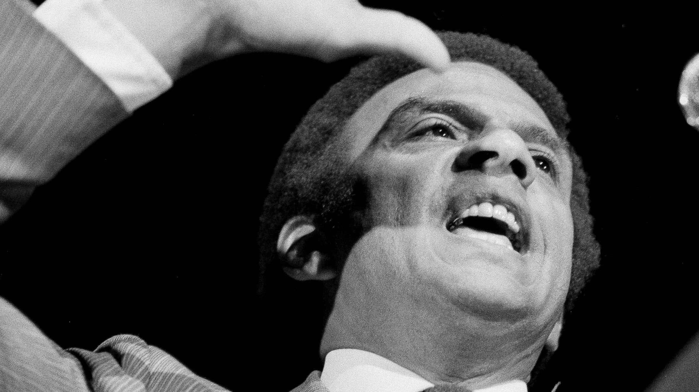 Andrew Young, former U.S. Ambassador to the U.N., gestures as he addresses the National Conference for a Black Agenda for the 80s, March 1, 1980, in Richmond, Va. Young was guest speaker for Friday night's session. The conference continues through Sunday. - Associated Press