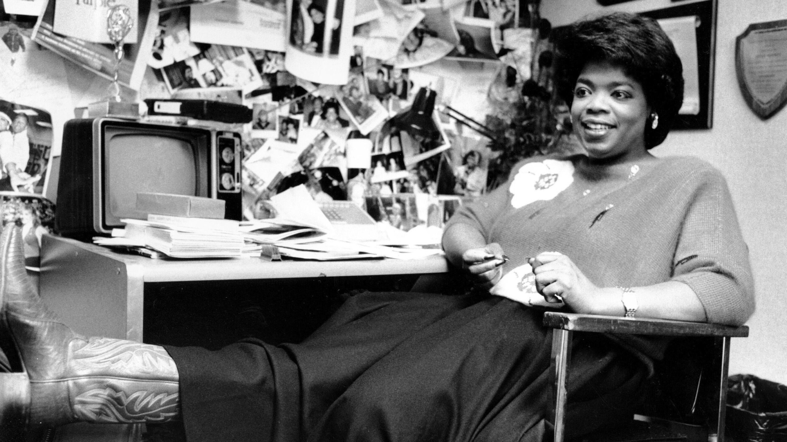 Television talk show host Oprah Winfrey puts her feet up as she relaxes in her studio office following a morning broadcast in Chicago, on Dec. 18, 1985. The Oprah Winfrey Show debuted in 1986. During its 25-year run, it become the highest-rated daytime talk show in television history. - Associated Press