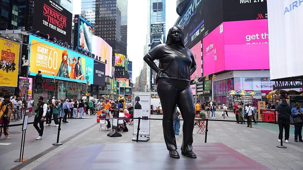 The 12-foot-tall bronze sculpture of a Black woman, titled Grounded in the Stars, stands at the Times Square on May 8, 2025 in New York city Photo: Getty Images Liao Pan