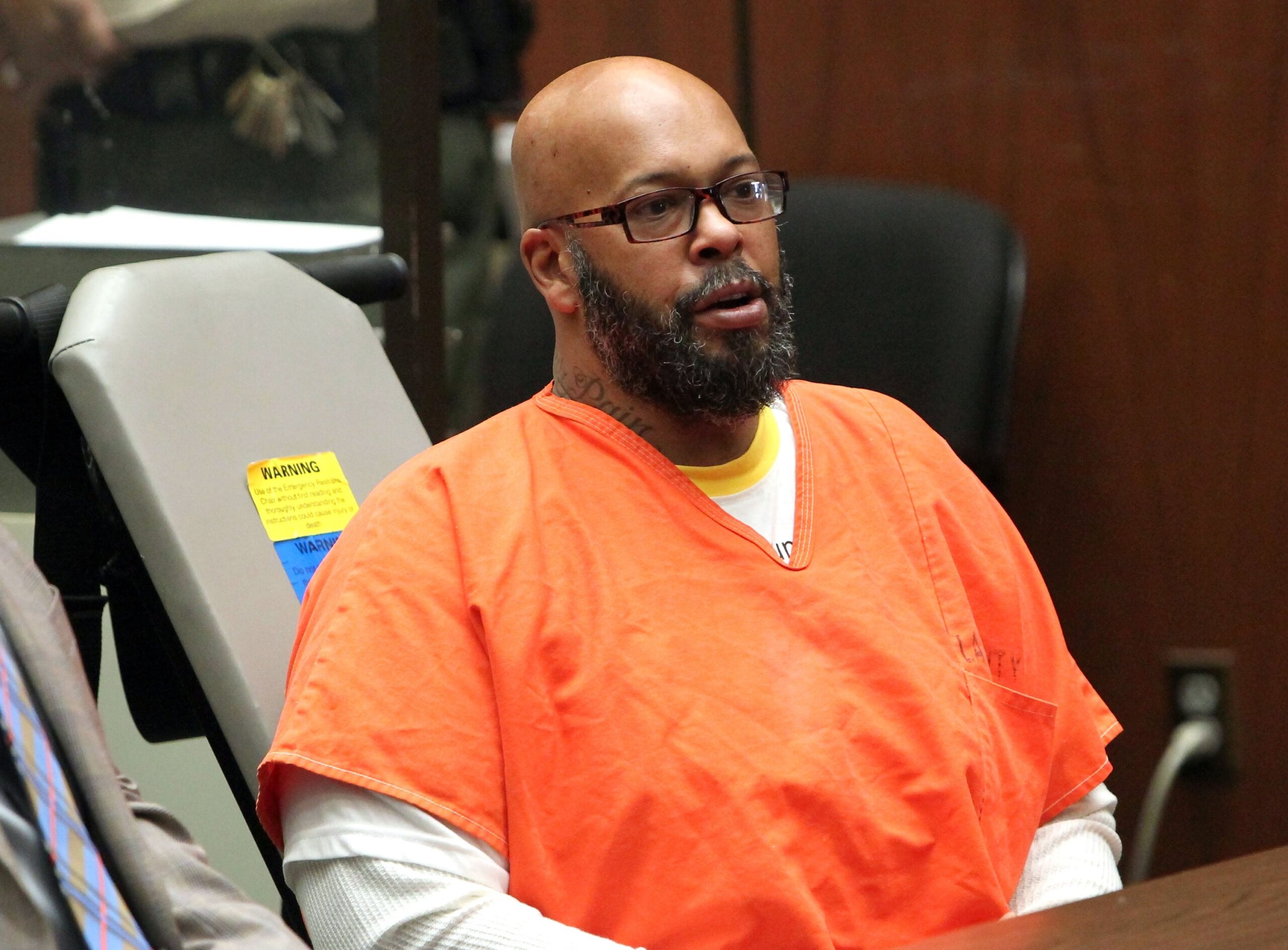 Marion ‘Suge’ Knight appears in court with his Lawyer Matthew P Fletcher for a preliminary hearing in a robbery charge case at Criminal Courts Building on April 8, 2015 in Los Angeles, California. Photo: Getty Images David Buchan