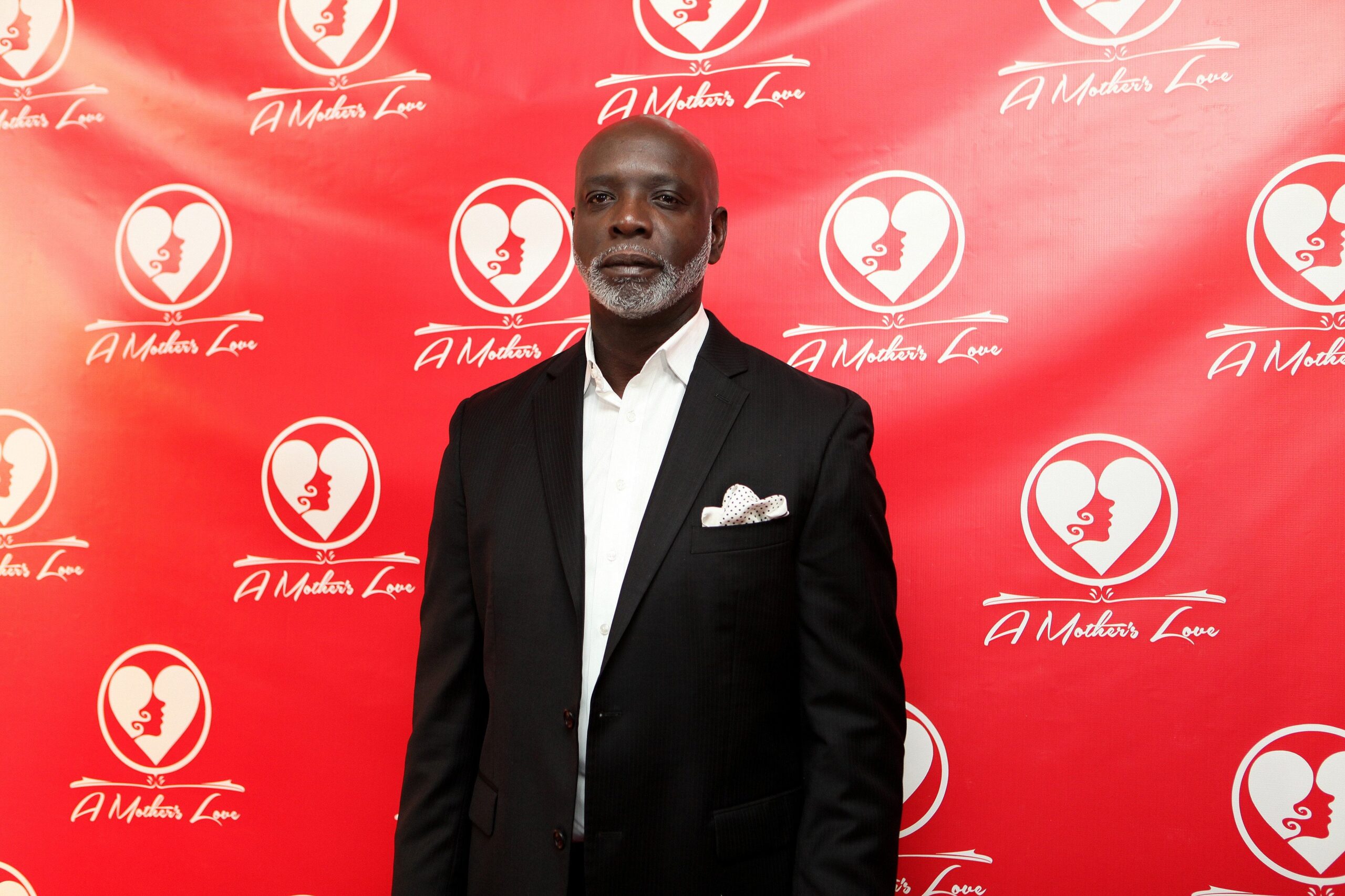 Peter Thomas from Bravo’s “Real Housewives Of Atlanta” poses for red carpet photos for “A Mother’s Love” stage play at the Rialto Center For The Arts in Atlanta, Georgia on NOVEMBER 22, 2013 Image: Getty Images Photo By Raymond Boyd/Getty Images
