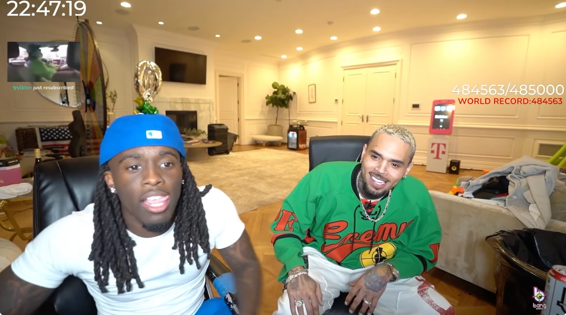 Kai Cenat, left; Chris Brown. Screenshot: YouTube/Kai Cenat Live