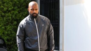 Really, Kanye? New Lawsuit Accuses Rapper Of Wearing This Very Offensive Insignia at Work