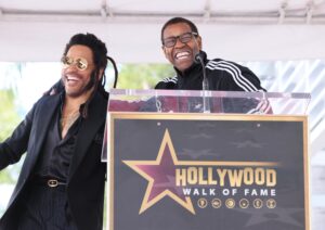Wait, What? Lenny Kravitz Takes Phone Call From Denzel Washington While On Stage