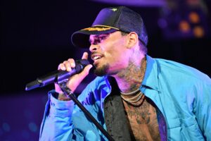 WATCH: How The Hell Did Chris Brown End Up Stuck and Dangling in The Air Like That?