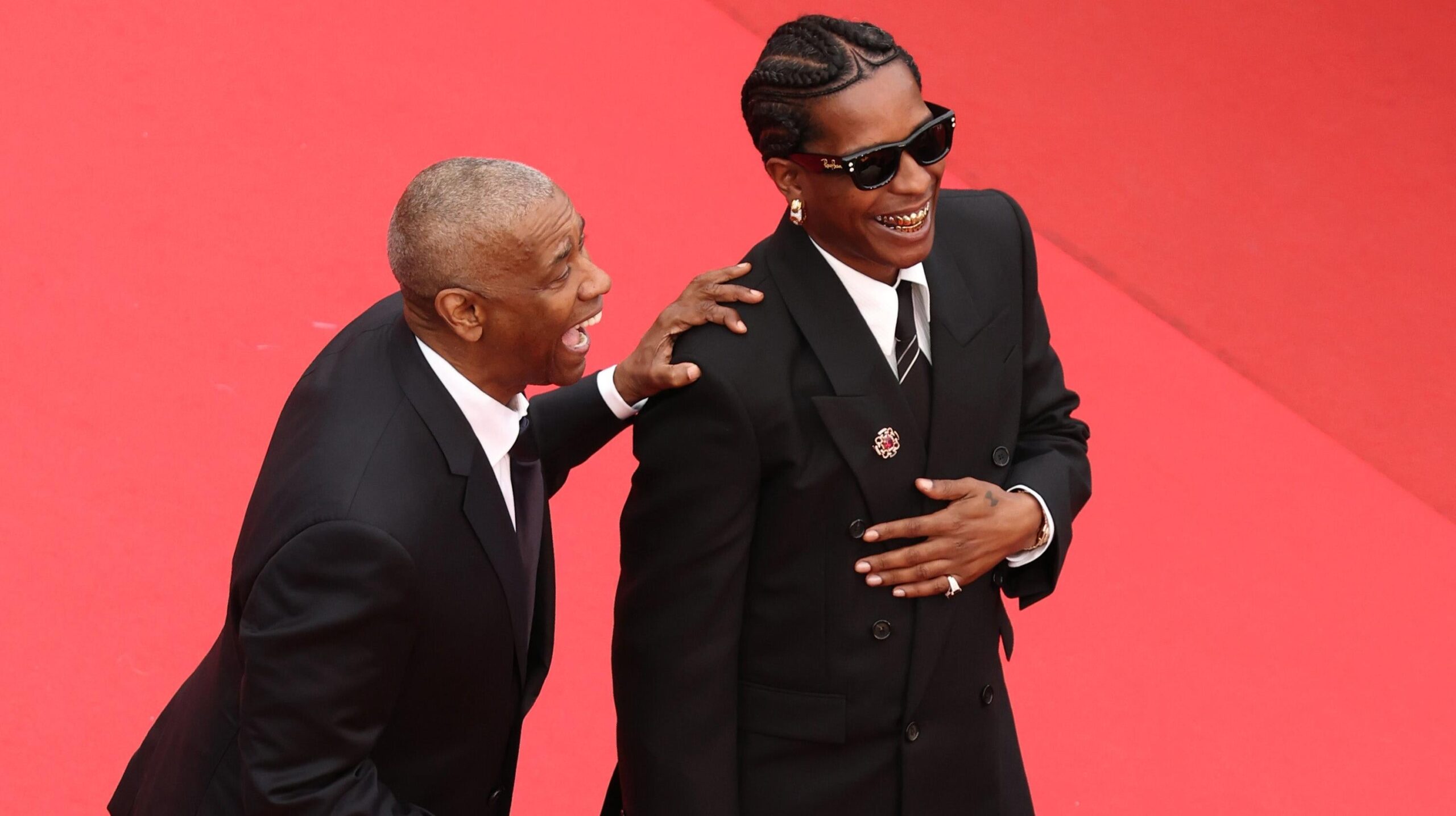 CANNES, FRANCE - MAY 19: Denzel Washington and A$AP Rocky attend the “Highest 2 Lowest” red carpet at the 78th annual Cannes Film Festival at Palais des Festivals on May 19, 2025 in Cannes, France. Photo: Getty Images Monica Schipper