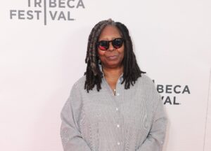 Whoopi Goldberg Returns to The View Wearing Folding Chair Necklace In Honor of Montgomery Brawl