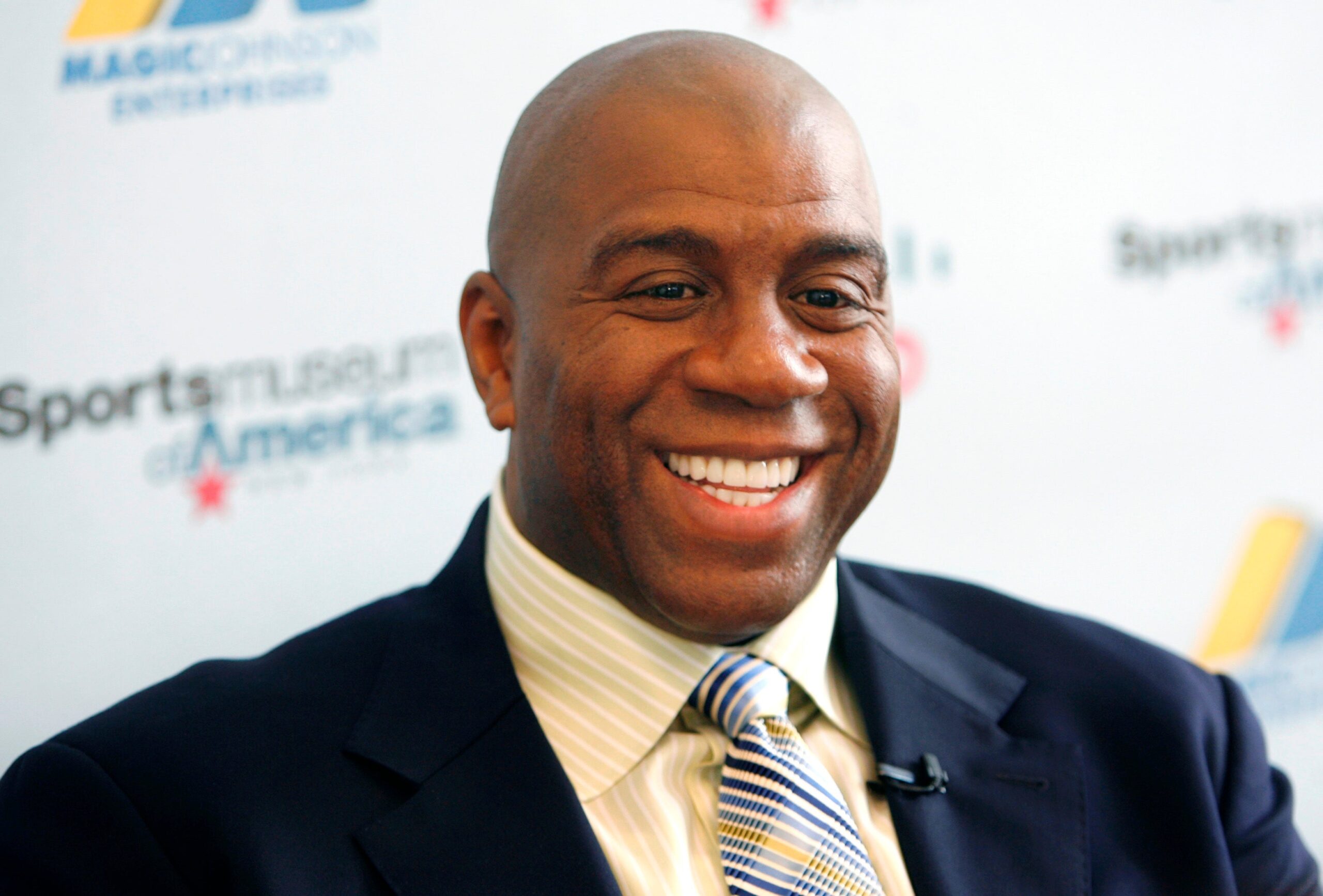 Basketball legend turned entrepreneur Magic Johnson tours the Sports Museum of America in New York, Friday, Nov. 21, 2008. Johnson was there to promote his new book, “32 Ways to be a Champion in Business”. Photo: AP Seth Wenig