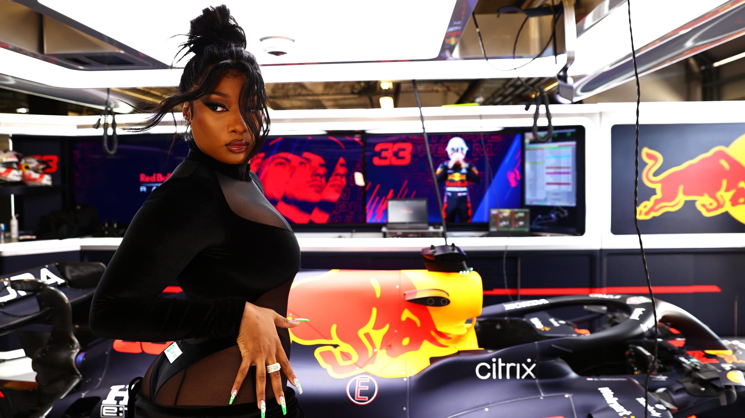 Megan Thee Stallion poses for a photo in the Red Bull Racing garage before the F1 Grand Prix of USA on October 24, 2021 in Austin, Texas. Photo: Getty Images Mark Thompson