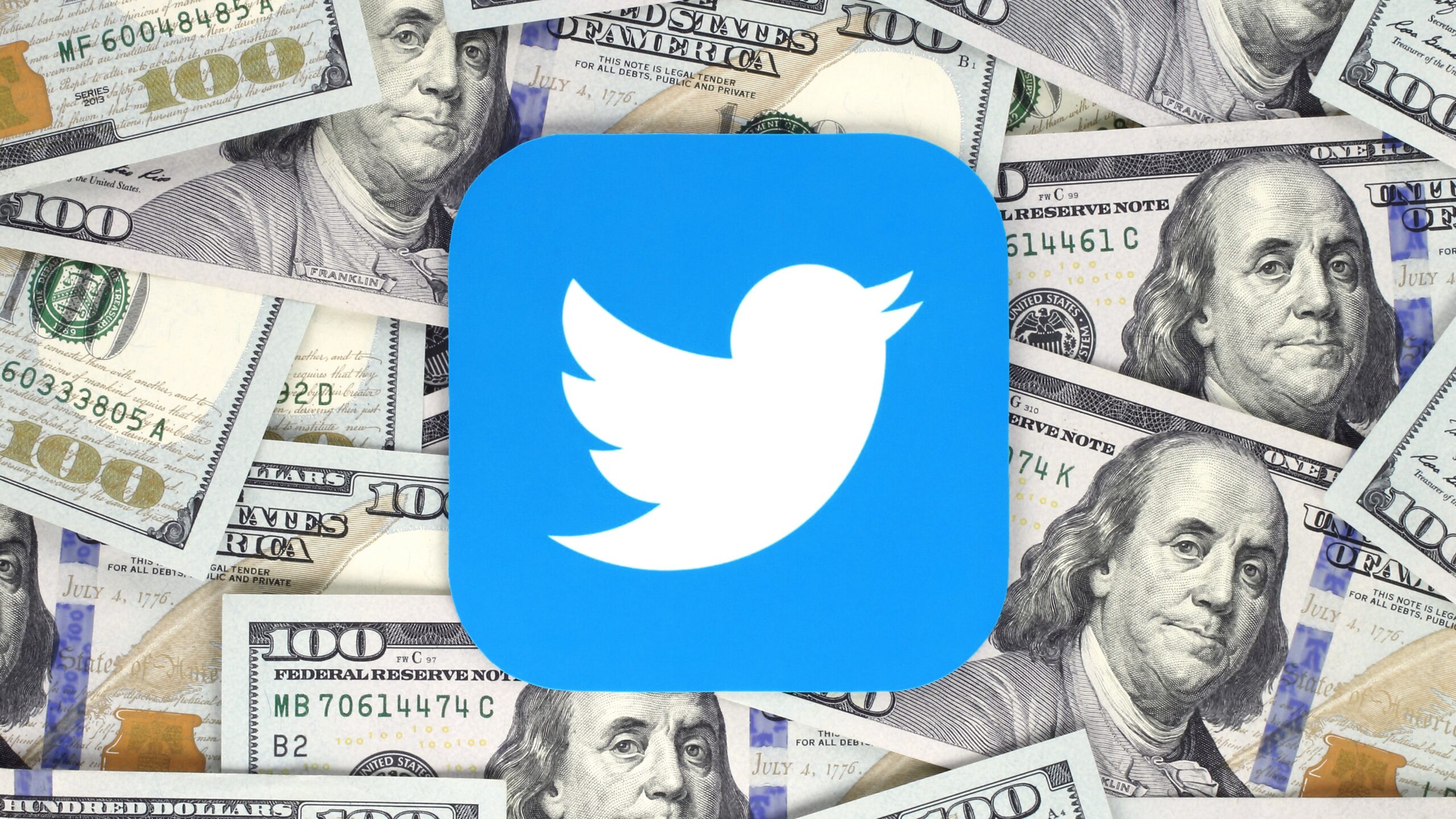 Twitter icon printed on paper and placed on money background. Graphic: Shutterstock rvlsoft