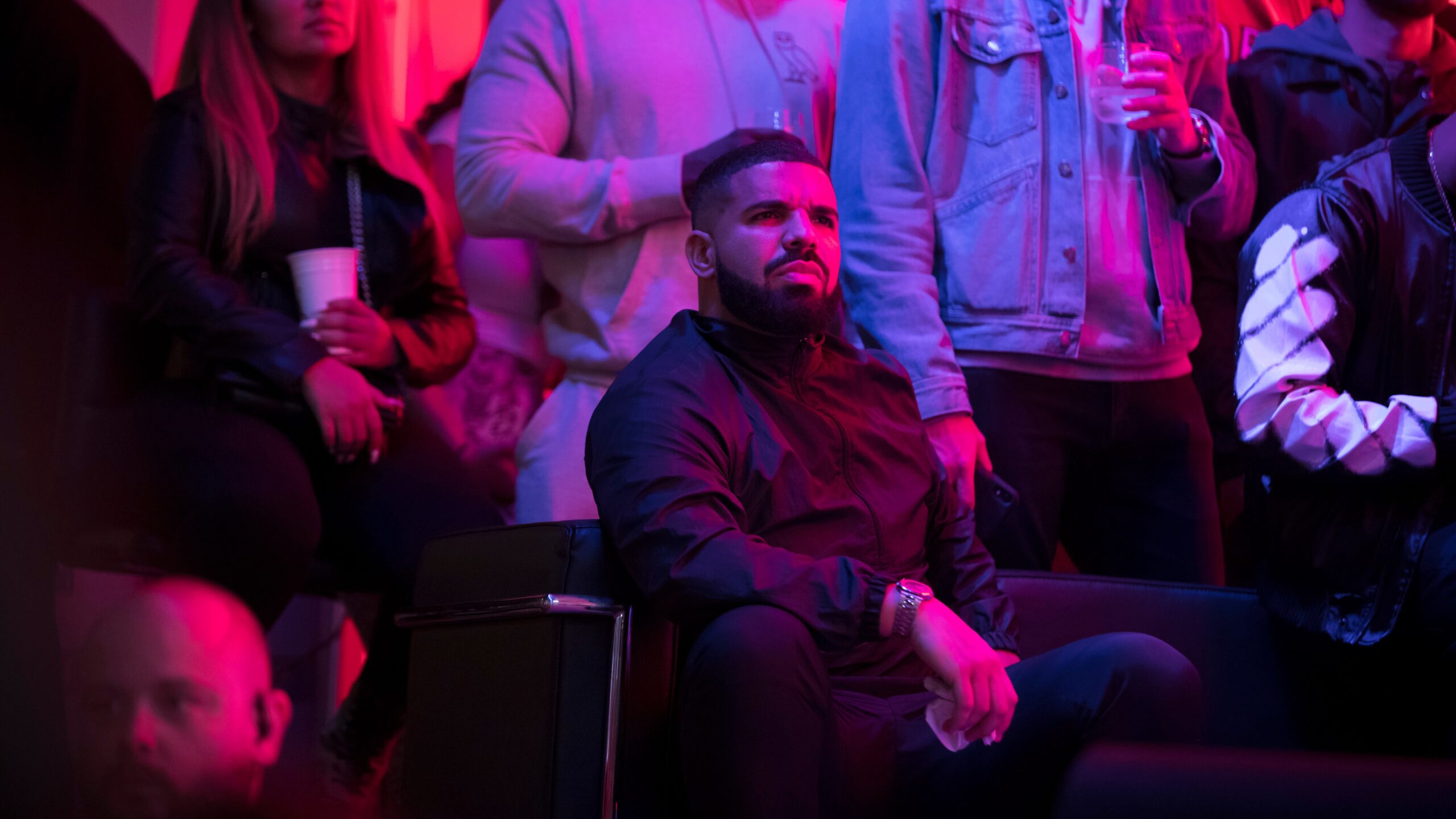 Drake watches a screen alongside other Toronto Raptors fans during Game Six of the NBA Finals on June 13, 2019 in Toronto, Canada. Photo: Getty Images Cole Burston