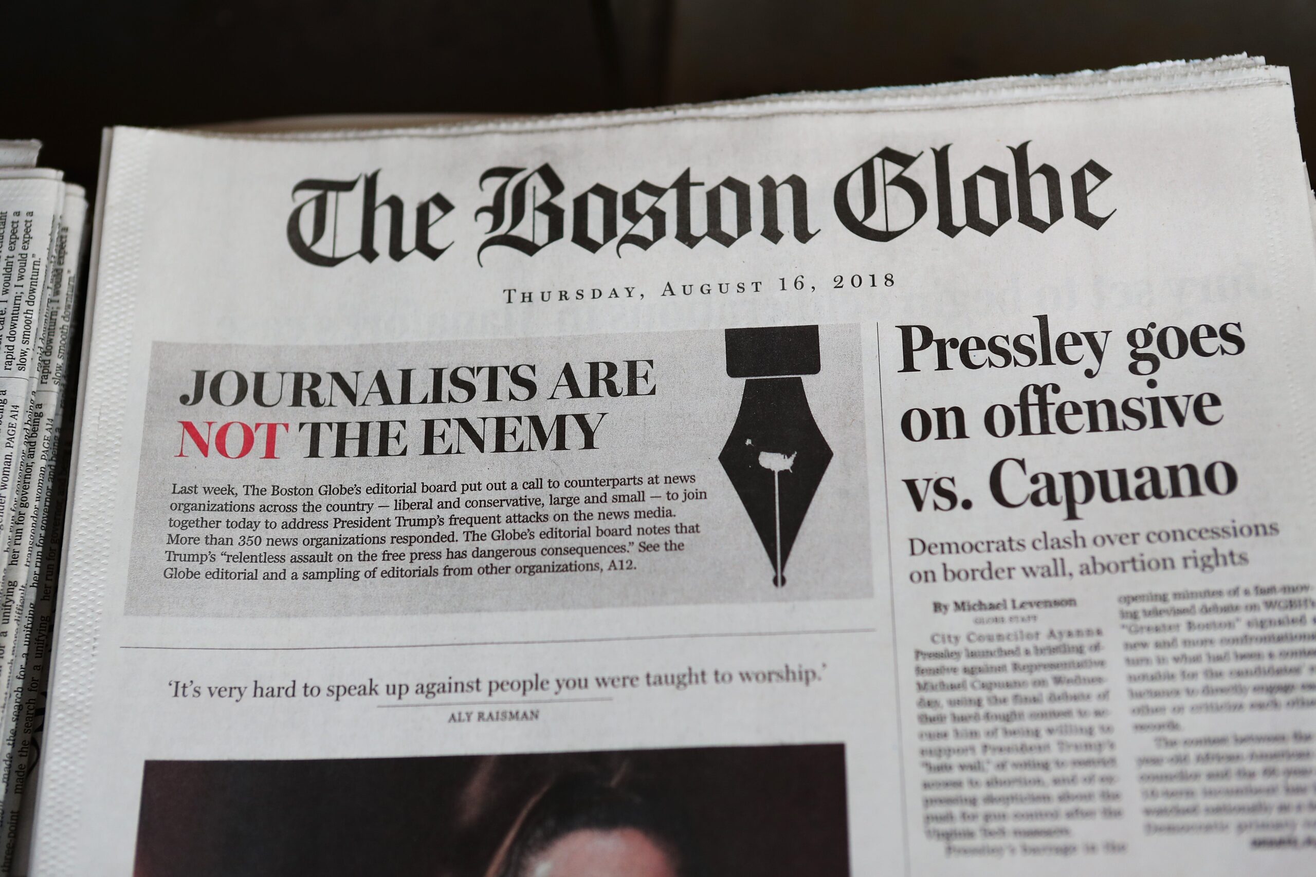 The front page of the Aug. 16, 2018, edition of the Boston Globe reads “Journalists are Not the Enemy” as part of an effort by newspapers to jointly decry Donald Trump’s description of the media as the “enemy of the people.” Now, in what’s being seen as a similar anti-press move, GOP lawmakers in Georgia are looking to put mandates on the press. Photo: Getty